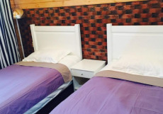 Байкал Хан Ольхон | поселок Хужир | С завтраком Двухместный номер с 2 отдельными кроватями и общей ванной комнатой