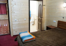 Таулу | Домбай | р. Аманауз | Катание на лыжах Люкс с 2 спальнями и камином 