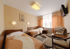Отель Барнаул Односпальная кровать в общем номере с 2 кроватями 