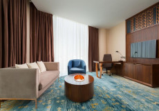 Hilton Astana | Астана | Парковка Улучшенный люкс с кроватью размера «king-size»