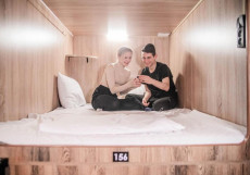 Капсульный отель на Белорусской Односпальная кровать в общем номере для мужчин и женщин 