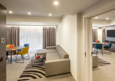 Отель Новотель Москва Сити - Novotel Moscow City Двухместный номер Executive Deluxe с видом на город двуспальная кровать